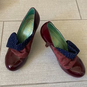 Irregular Choice heels with fabric button foldover. Maroon and black